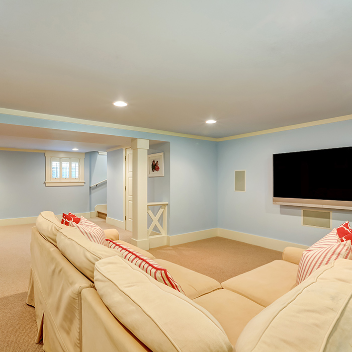couches and tv on a newly remodeled basement hamburg ny